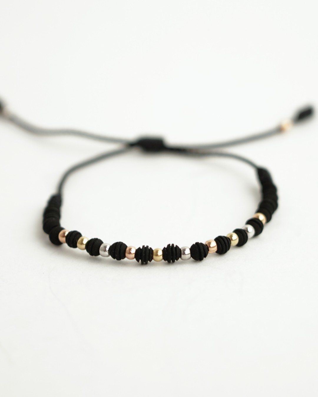 PULSERA DENARIO NEOPRENO 3 OROS