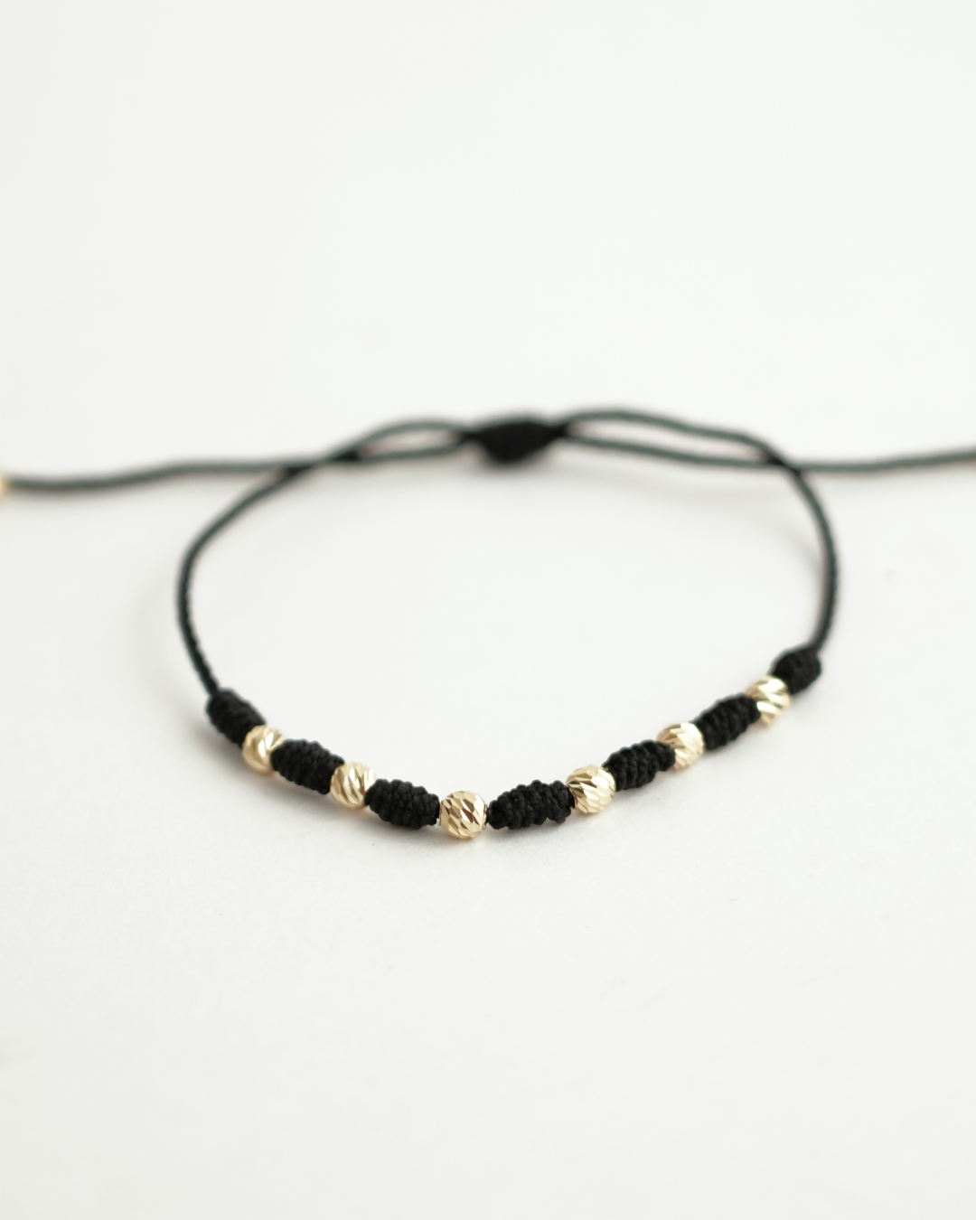 PULSERA SIETE NUDOS BOLA DIAMANTADA