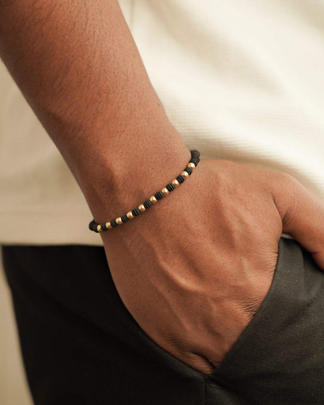 PULSERA DENARIO NEOPRENO ORO AMARILLO