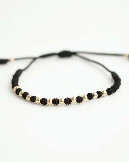 PULSERA DENARIO NEOPRENO ORO AMARILLO